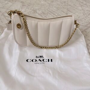 COACH Swinger 20 Leather Clutch